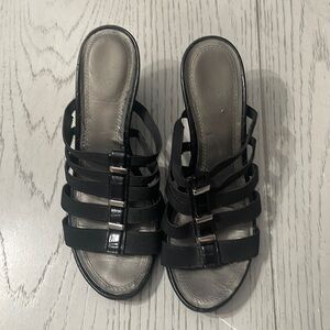 Strappy black wedge heels